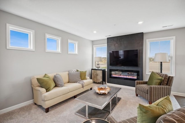 2154 Tyrone Dr, Shakopee, MN 55379 - living room with baseboards, recessed lighting, a large fireplace, and carpet flooring
