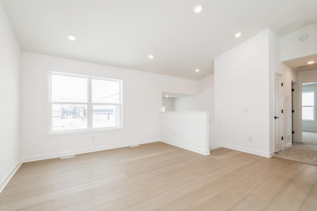 2354 Jandell Ave NE, Saint Michael, MN 55376 - spare room with light wood-type flooring, recessed lighting, baseboards, and a smoke detector