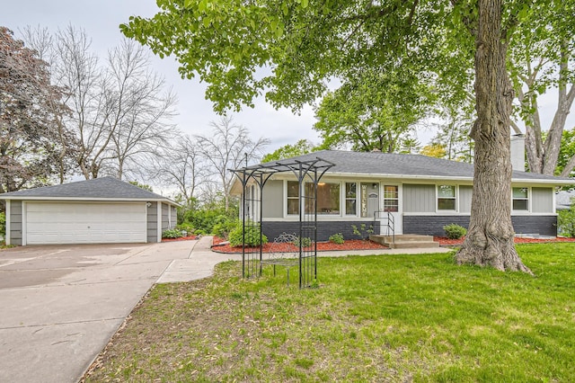 4989 Turtle Ln W, Shoreview, MN 55126 - view of front of property featuring a detached garage, brick siding, and a front lawn