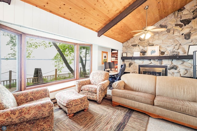 41780 Kansas Point Ln, Pelican Rapids, MN 56572 - living area with plenty of natural light, wooden ceiling, ceiling fan, a stone fireplace, and a baseboard radiator