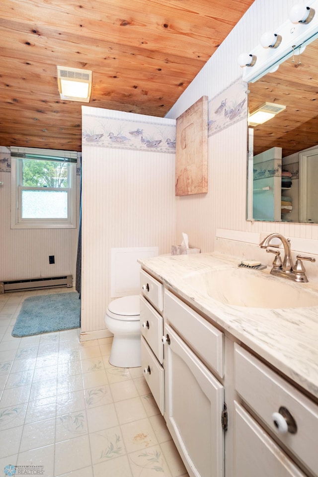 41780 Kansas Point Ln, Pelican Rapids, MN 56572 - full bath featuring baseboard heating, wooden ceiling, vanity, toilet, and vaulted ceiling