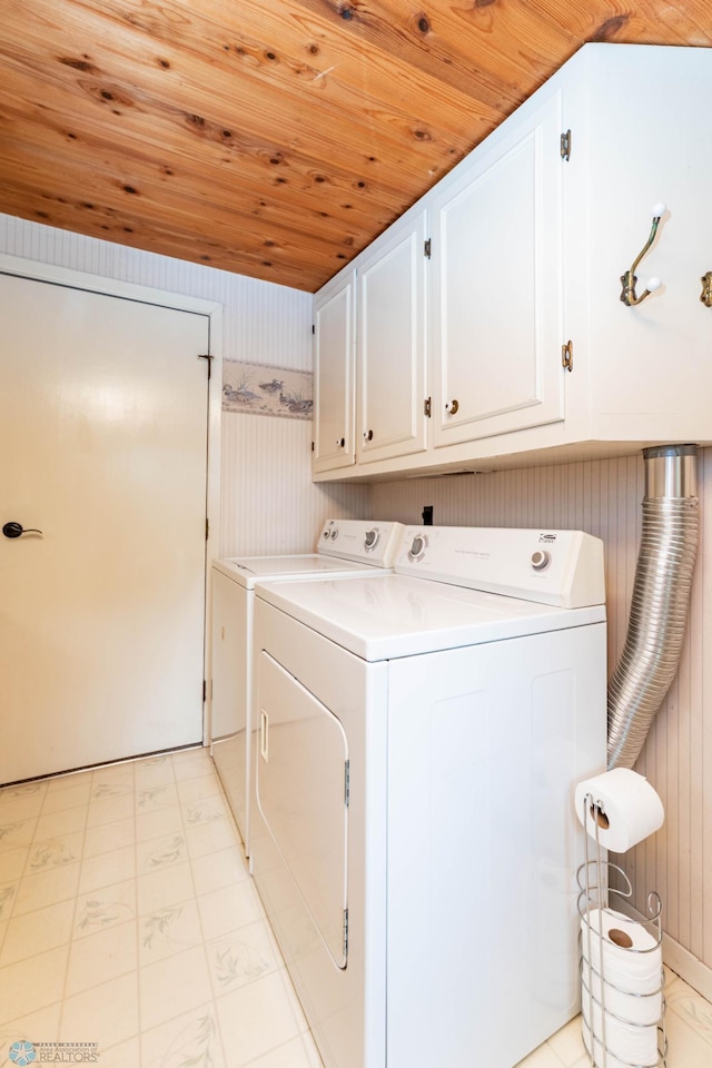 41780 Kansas Point Ln, Pelican Rapids, MN 56572 - washroom with cabinet space, separate washer and dryer, wood ceiling, and light flooring