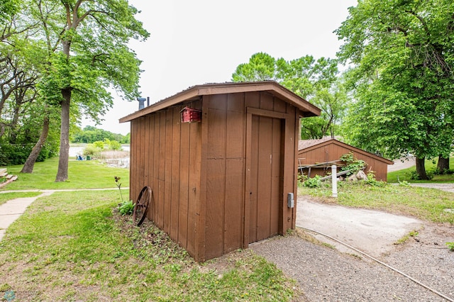 41780 Kansas Point Ln, Pelican Rapids, MN 56572 - view of shed with a water view