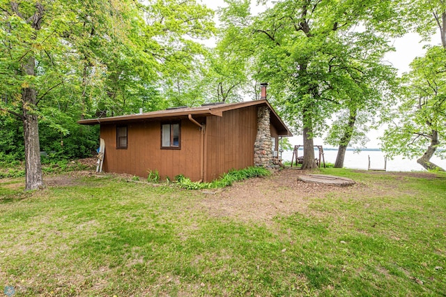 41780 Kansas Point Ln, Pelican Rapids, MN 56572 - view of side of property featuring a lawn