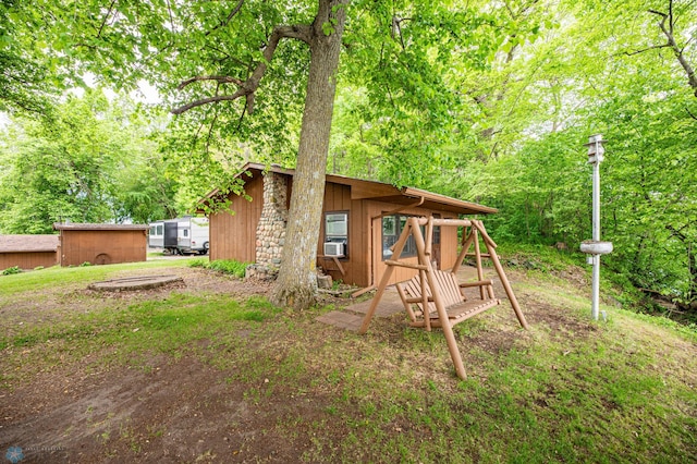 41780 Kansas Point Ln, Pelican Rapids, MN 56572 - view of yard featuring an outdoor structure and cooling unit