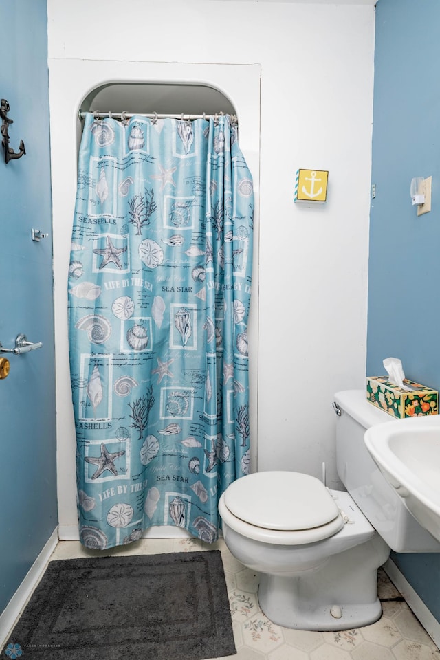 41780 Kansas Point Ln, Pelican Rapids, MN 56572 - bathroom featuring toilet and a shower with shower curtain