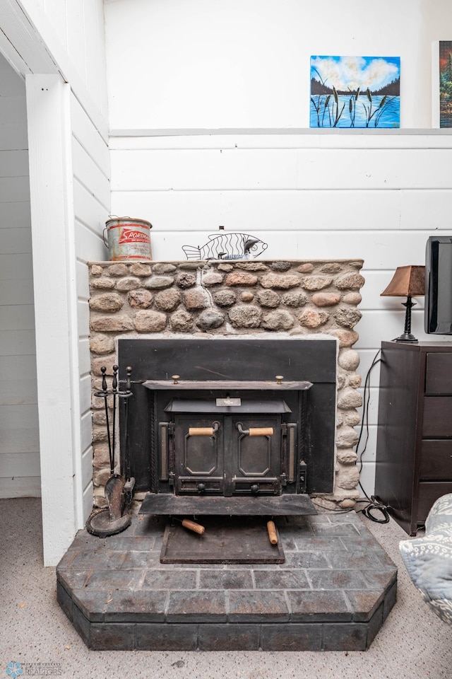 41780 Kansas Point Ln, Pelican Rapids, MN 56572 - detailed view of a wood stove and speckle patterned floor