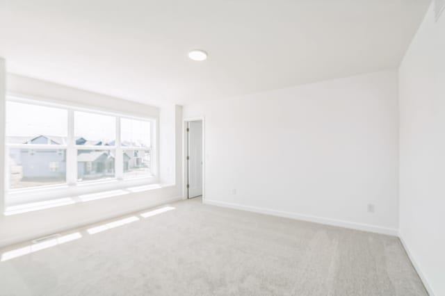 6743 Tamarack Ln, Corcoran, MN 55340 - unfurnished room with light carpet and baseboards