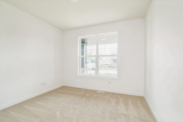 6743 Tamarack Ln, Corcoran, MN 55340 - empty room featuring baseboards and light colored carpet
