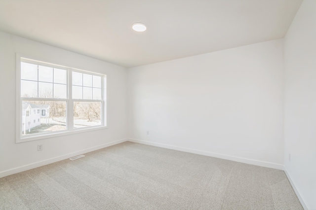 6743 Tamarack Ln, Corcoran, MN 55340 - empty room with light carpet, baseboards, and recessed lighting
