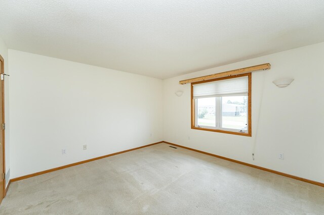 2225 Fisher Ct NW, Rochester, MN 55901 - unfurnished room featuring light carpet