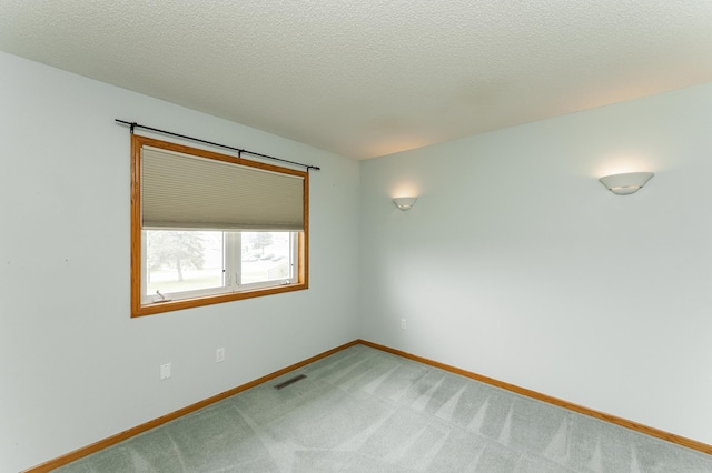 2225 Fisher Ct NW, Rochester, MN 55901 - unfurnished room with light colored carpet and a textured ceiling