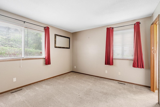2310 Benson Ave Unit H, Saint Paul, MN 55116 - empty room featuring light carpet and baseboards