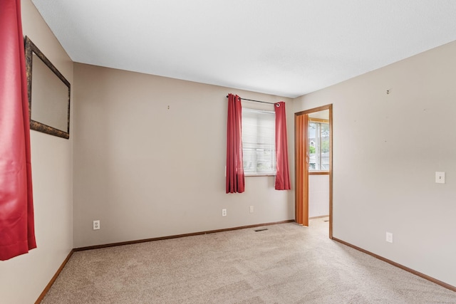2310 Benson Ave Unit H, Saint Paul, MN 55116 - spare room with carpet floors and baseboards