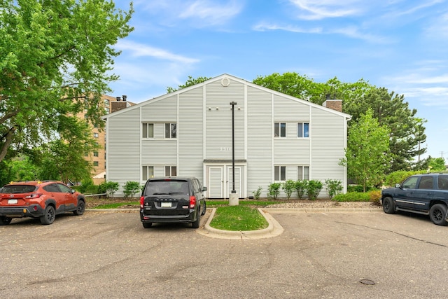 2310 Benson Ave Unit H, Saint Paul, MN 55116 - view of building exterior with uncovered parking