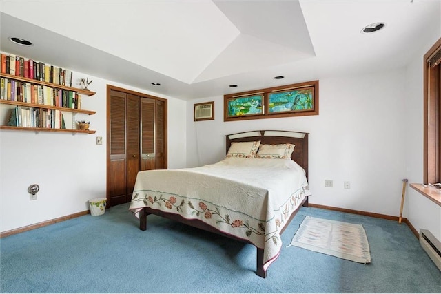 20907 Erickson Ln, Trade Lake, WI 54840 - carpeted bedroom featuring an AC wall unit, a baseboard heating unit, recessed lighting, baseboards, and a closet