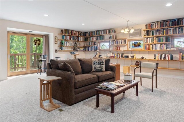 20907 Erickson Ln, Trade Lake, WI 54840 - carpeted living room featuring recessed lighting and a chandelier