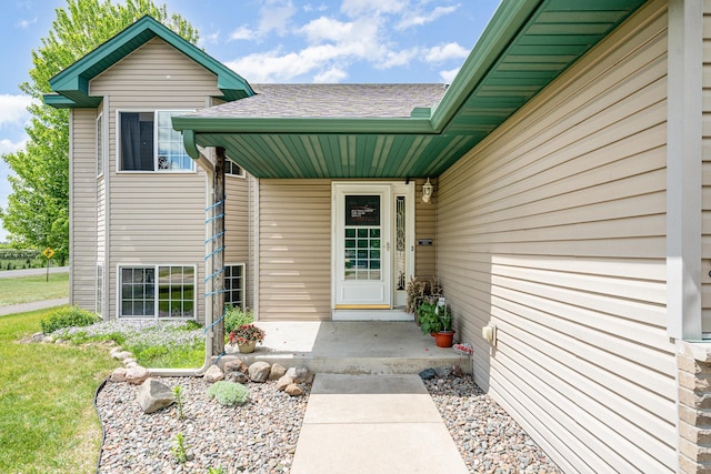 509 8th Ave SE, Isanti, MN 55040 - entrance to property featuring roof with shingles and covered porch