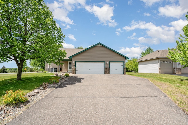 509 8th Ave SE, Isanti, MN 55040 - view of front facade with a front lawn, a garage, driveway, and roof with shingles