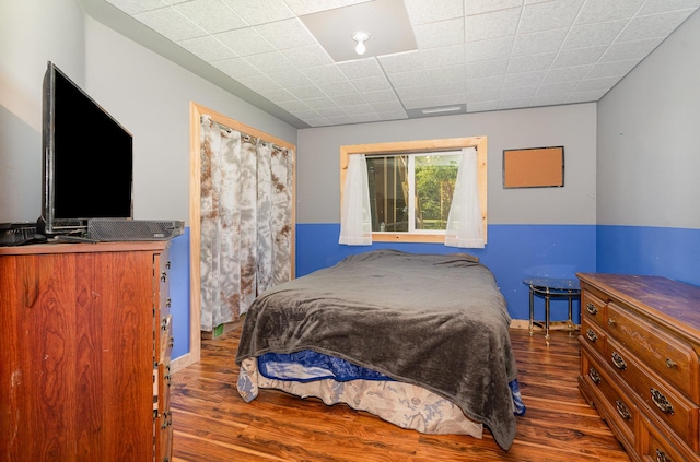 509 8th Ave SE, Isanti, MN 55040 - bedroom featuring dark wood finished floors