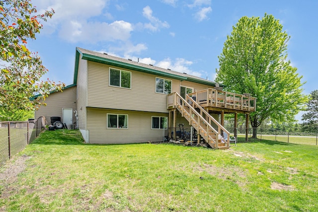 509 8th Ave SE, Isanti, MN 55040 - rear view of property featuring stairway and a wooden deck