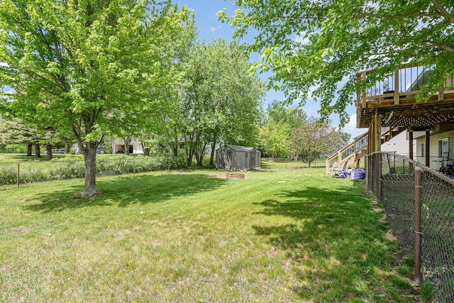 509 8th Ave SE, Isanti, MN 55040 - view of yard featuring a wooden deck and stairway