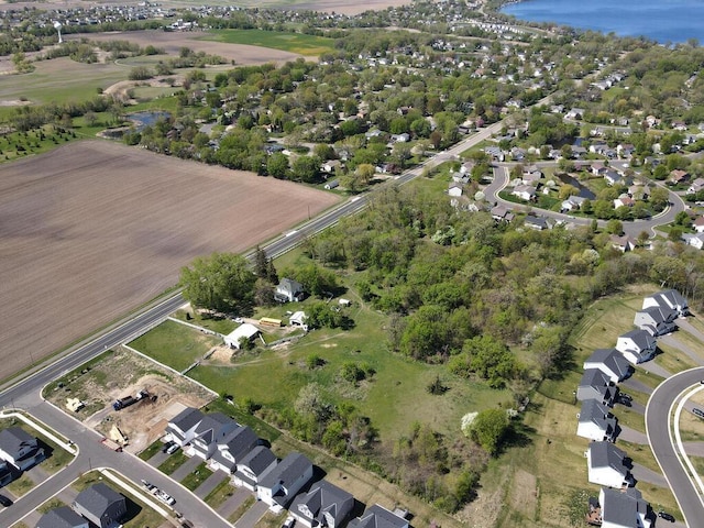 2840 30th St NE, Buffalo Twp, MN 55313 - aerial overview of property's location with a nearby body of water and nearby suburban area