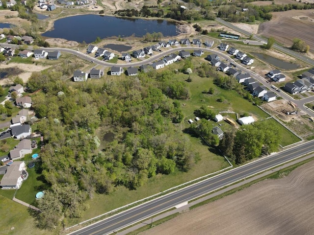2840 30th St NE, Buffalo Twp, MN 55313 - aerial view of property and surrounding area with a nearby body of water and nearby suburban area