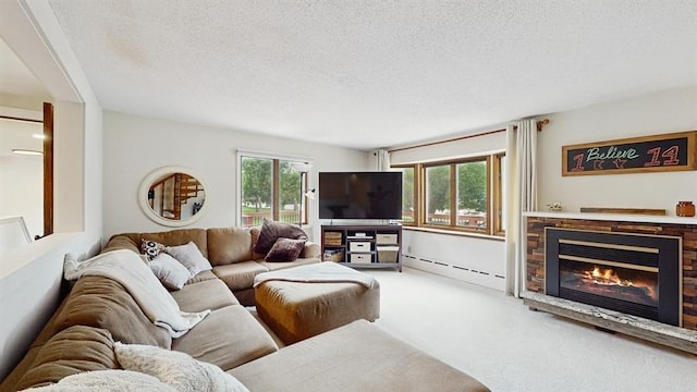 13993 Crosstown Blvd NW, Andover, MN 55304 - living room featuring a baseboard heating unit, carpet, a glass covered fireplace, and a textured ceiling