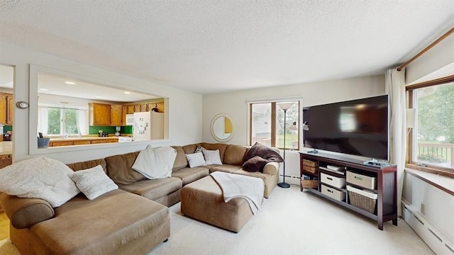 13993 Crosstown Blvd NW, Andover, MN 55304 - living room featuring baseboard heating, light carpet, a textured ceiling, a baseboard heating unit, and recessed lighting