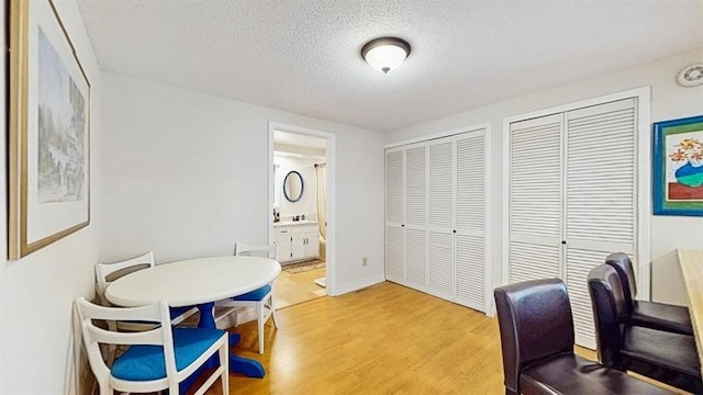 13993 Crosstown Blvd NW, Andover, MN 55304 - office area with light wood finished floors and a textured ceiling