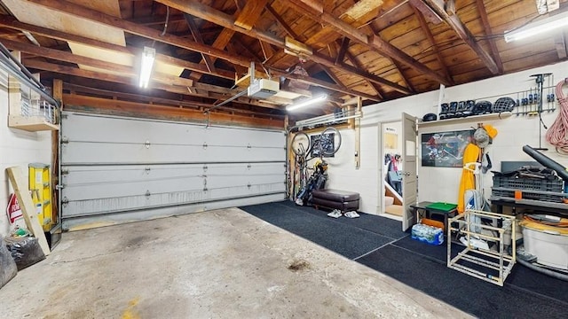 13993 Crosstown Blvd NW, Andover, MN 55304 - garage featuring a garage door opener