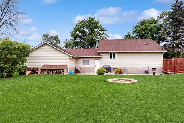13993 Crosstown Blvd NW, Andover, MN 55304 - back of property with a patio area, a fire pit, and roof with shingles