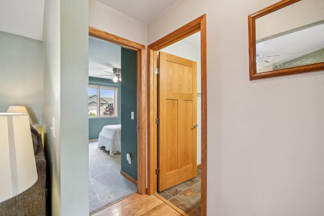106 Prairie Grass Dr, Osceola, WI 54020 - hallway with baseboards and wood finished floors