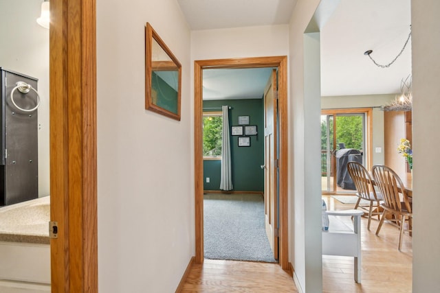 106 Prairie Grass Dr, Osceola, WI 54020 - hallway featuring baseboards and light wood-style floors