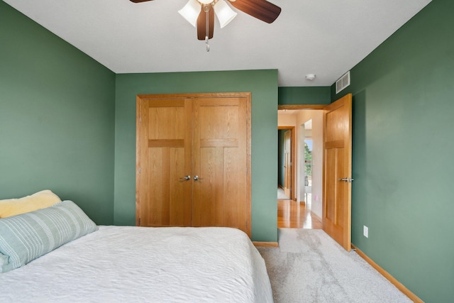 106 Prairie Grass Dr, Osceola, WI 54020 - bedroom featuring a closet, carpet, and a ceiling fan