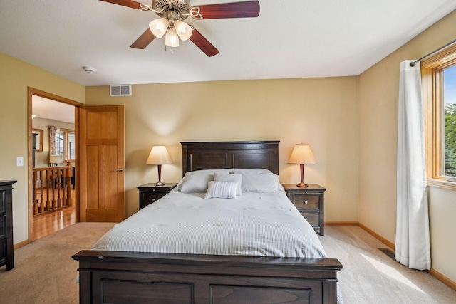 106 Prairie Grass Dr, Osceola, WI 54020 - bedroom with light carpet and a ceiling fan