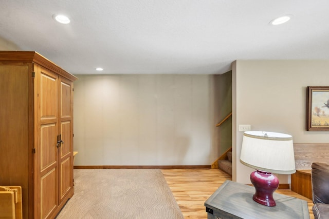 106 Prairie Grass Dr, Osceola, WI 54020 - interior space featuring light wood-type flooring, stairway, and recessed lighting