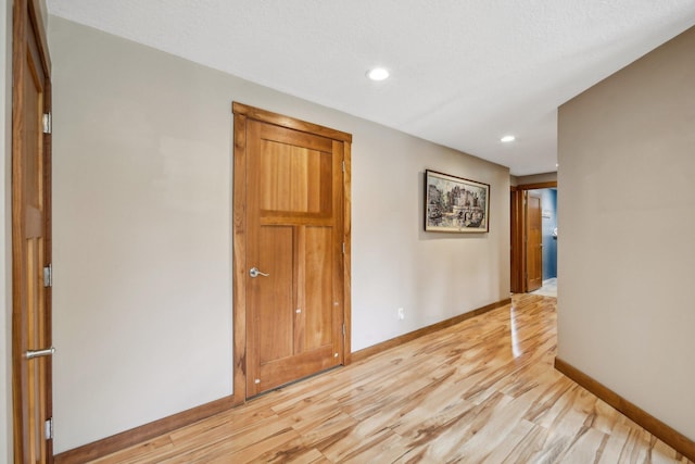 106 Prairie Grass Dr, Osceola, WI 54020 - corridor featuring light wood finished floors and recessed lighting