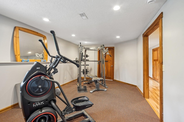 106 Prairie Grass Dr, Osceola, WI 54020 - exercise room with carpet flooring, recessed lighting, and a textured ceiling