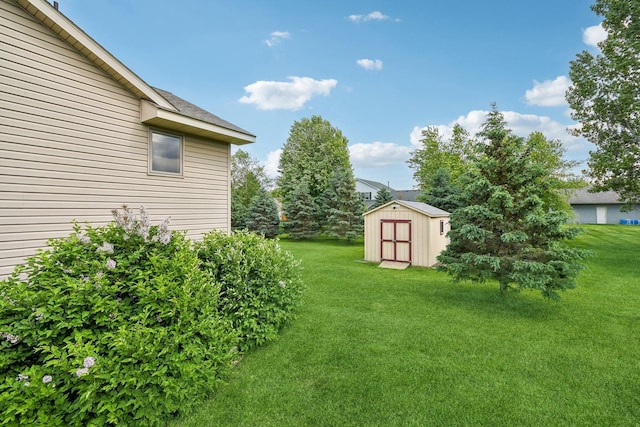 106 Prairie Grass Dr, Osceola, WI 54020 - view of grassy yard with a storage shed