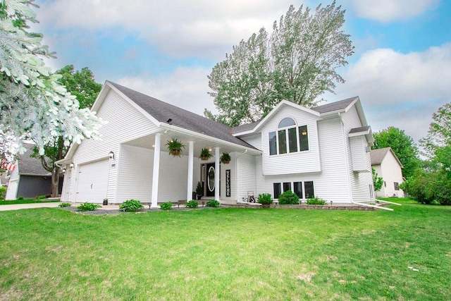 2109 Haughton Ave, North Mankato, MN 56003 - tri-level home with a garage, a front lawn, and concrete driveway