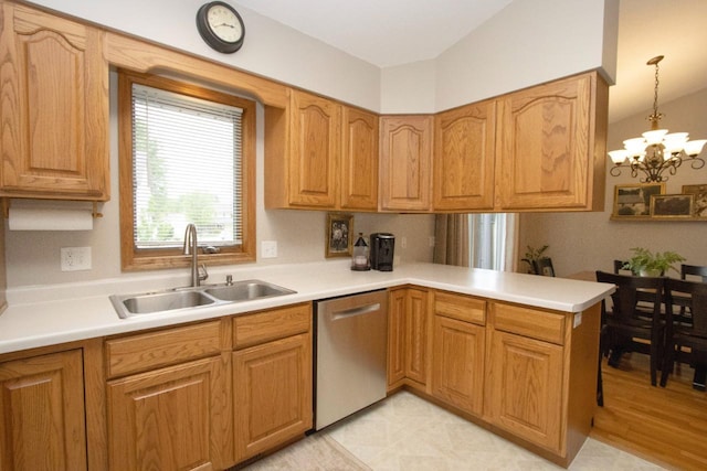 2109 Haughton Ave, North Mankato, MN 56003 - kitchen featuring stainless steel dishwasher, a sink, a peninsula, and light countertops