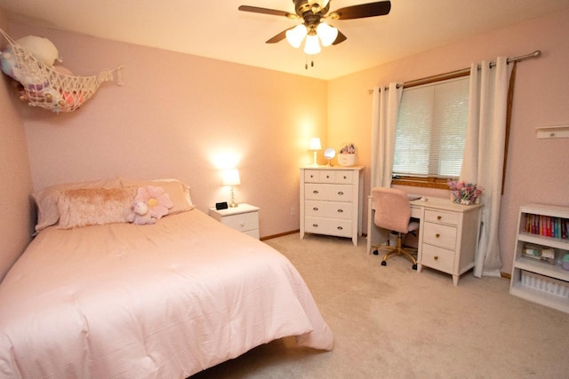 2109 Haughton Ave, North Mankato, MN 56003 - bedroom with light carpet, a ceiling fan, and baseboards