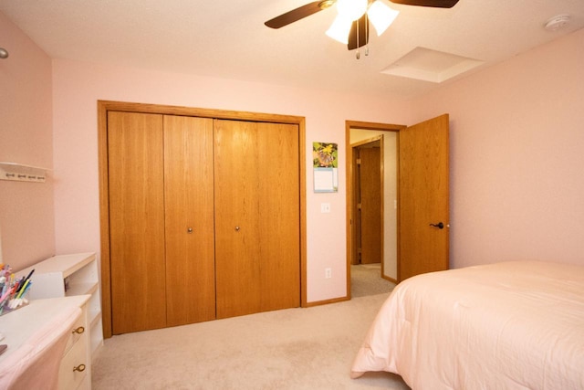 2109 Haughton Ave, North Mankato, MN 56003 - carpeted bedroom with a closet and a ceiling fan