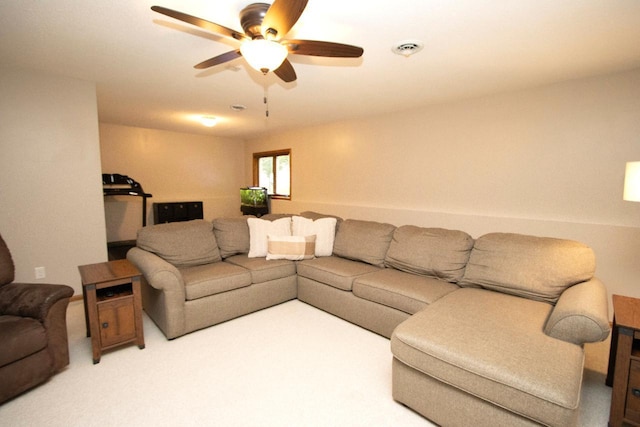2109 Haughton Ave, North Mankato, MN 56003 - living area featuring ceiling fan and carpet flooring