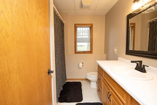 2109 Haughton Ave, North Mankato, MN 56003 - full bath with vanity, tile patterned flooring, toilet, a drop ceiling, and curtained shower