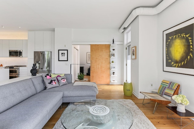 2845 Colfax Ave S Unit W305, Minneapolis, MN 55408 - living room with wood finished floors