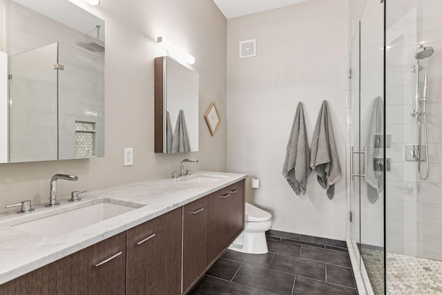 2845 Colfax Ave S Unit W305, Minneapolis, MN 55408 - full bath featuring toilet, a shower stall, double vanity, and tile patterned flooring