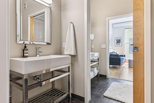 2845 Colfax Ave S Unit W305, Minneapolis, MN 55408 - bathroom featuring baseboards and tile patterned floors